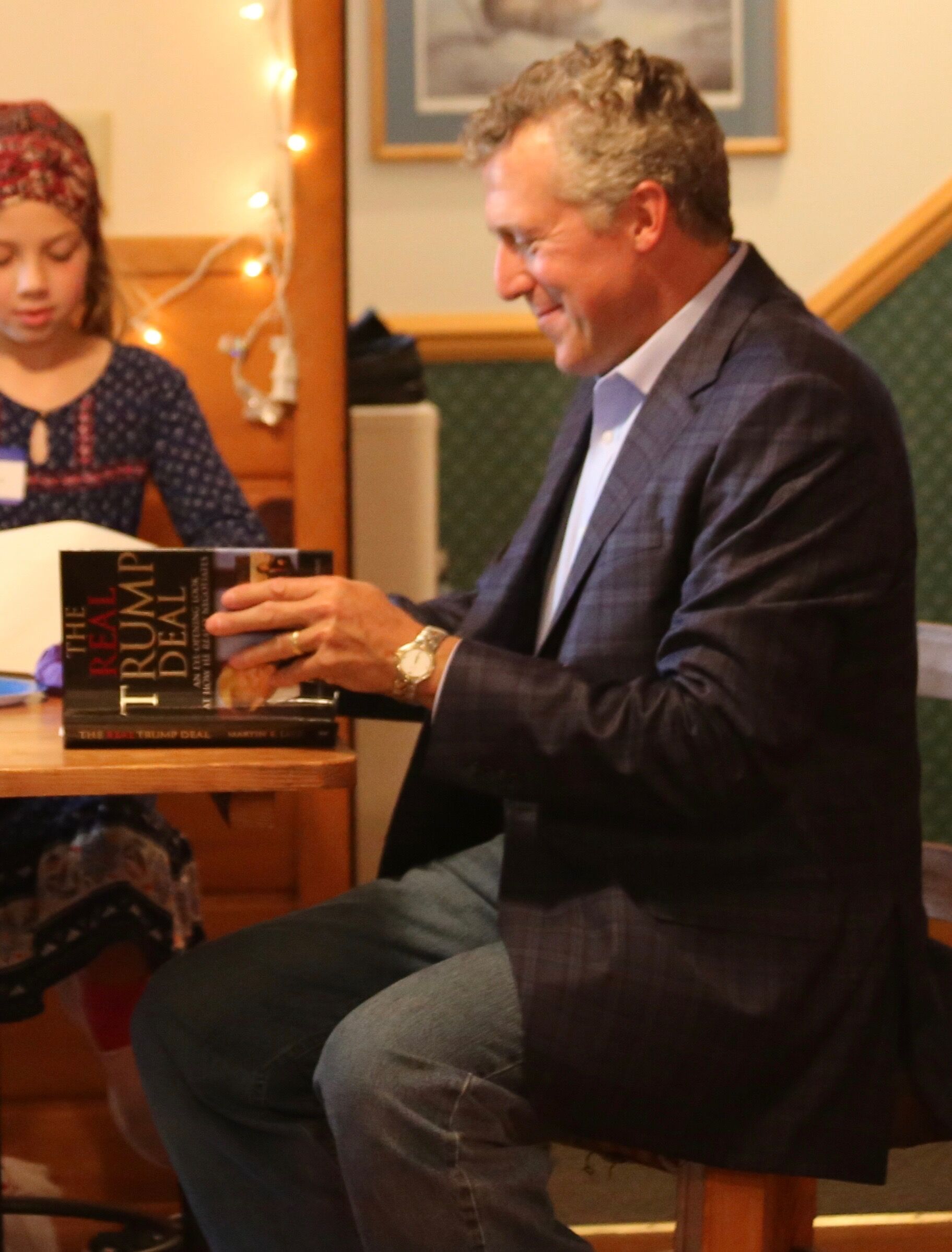 Photo of Negotiation Expert Marty Latz at book signing